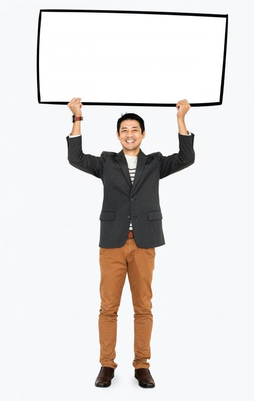 Cheerful man showing a blank white banner - 491138