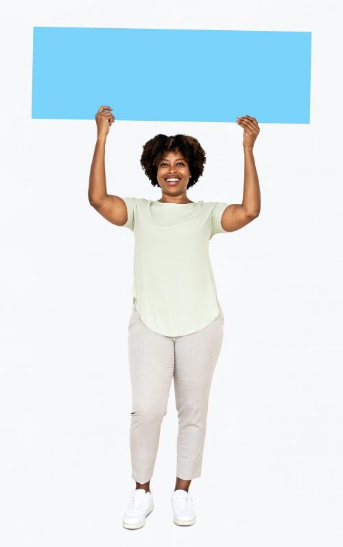 Cheerful woman showing a blank blue banner - 491153