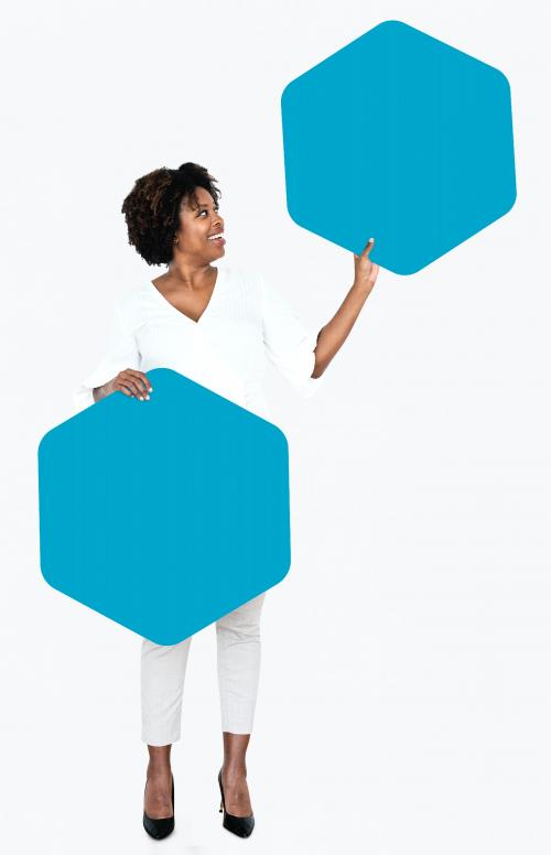 Cheerful woman showing blue hexagon shaped boards - 491176