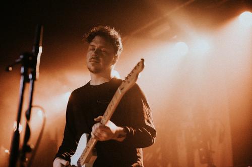 Guitarist playing electric guitar in a rock concert - 2273408