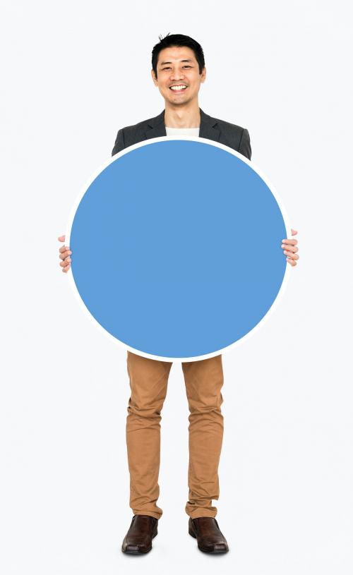 Businessman holding a blue round board - 491226