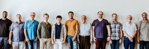 Cheerful diverse men standing in a line social banner - 2027843