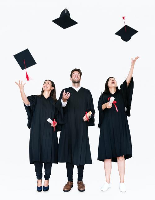 Group of grads throwing their hats in the air - 477574