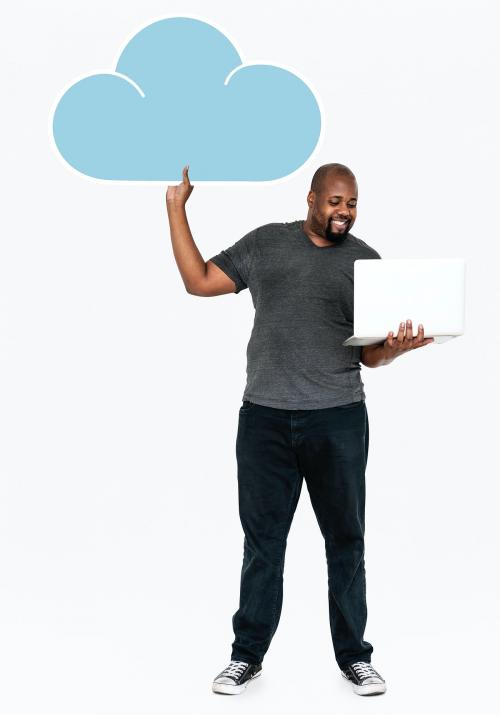 Cheerful man holding online cloud storage symbols - 477576