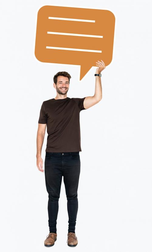 Cheerful man holding a blank speech bubble symbol - 477607