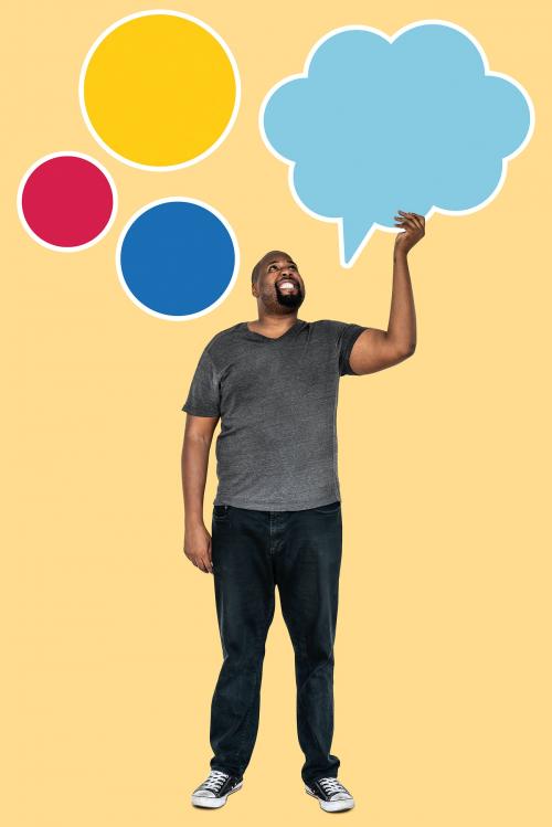 Cheerful man holding a blank speech bubble - 477629