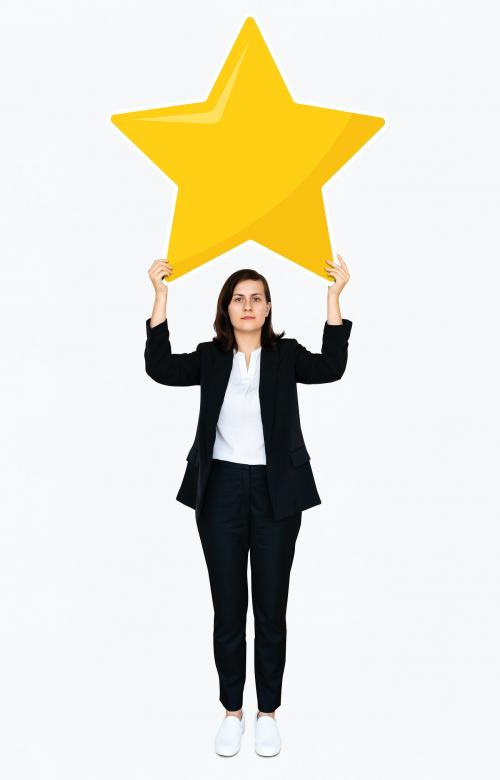 Businesswoman holding a golden star rating symbol - 477853