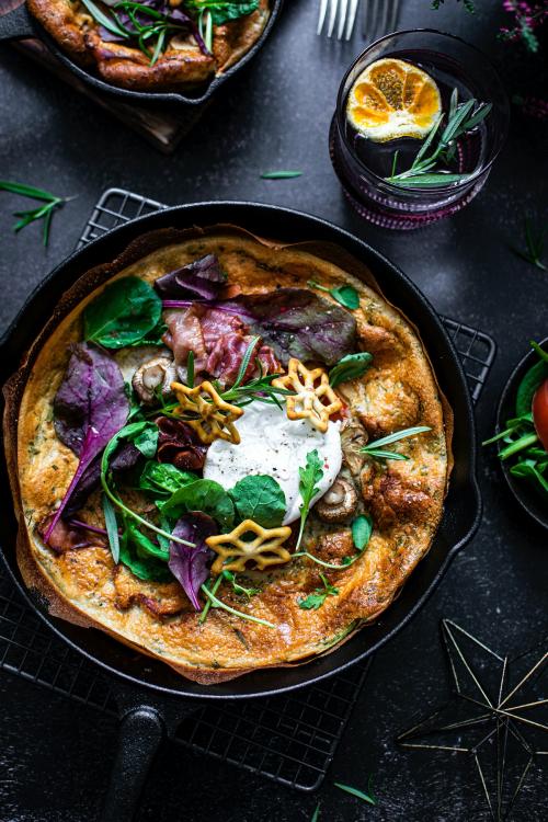 Dutch baby pancake with poached egg and prosciutto ham recipe - 2049713