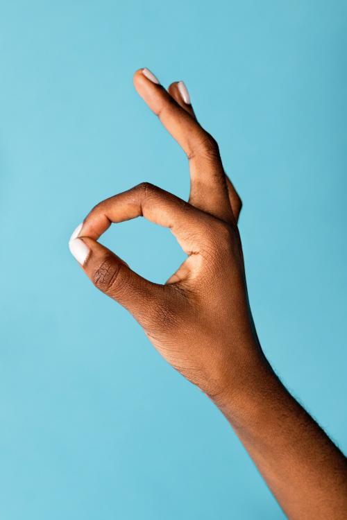 African American woman with an okay hand sign - 2053204