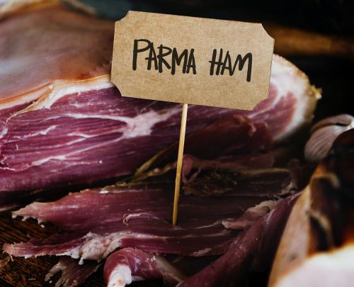 Parma ham on a wooden table - 484733