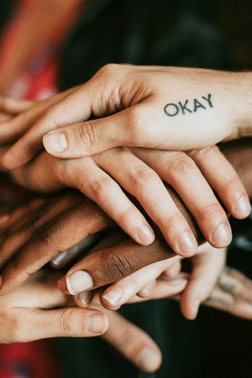 Diverse people stacking their hands - 2205485