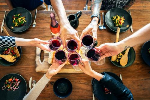 Friends making a toast at a dinner party - 2206522