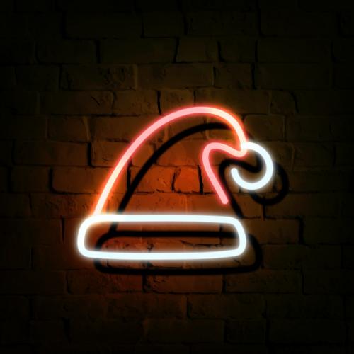 Santa hat neon sign on a dark brick wall vector - 1229927
