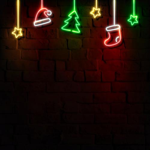Stars, Santa hat, stocking and Christmas tree neon sign on a dark brick wall vector - 1229929