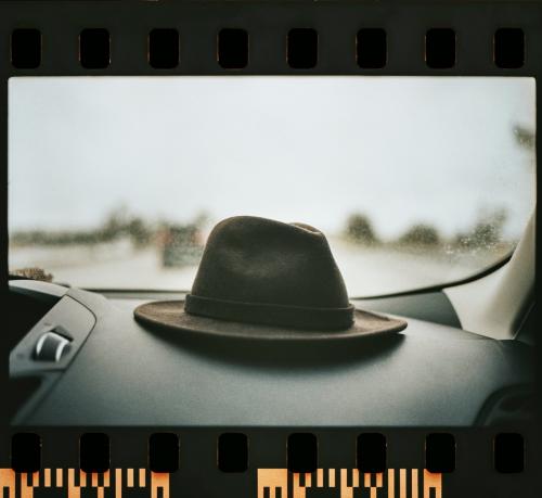 Hat on the dashboard of a car - 2268755