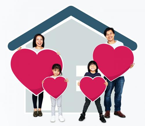 Happy family holding a heart shaped icon - 490547