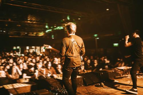 Guitarist playing in a concert - 2271104