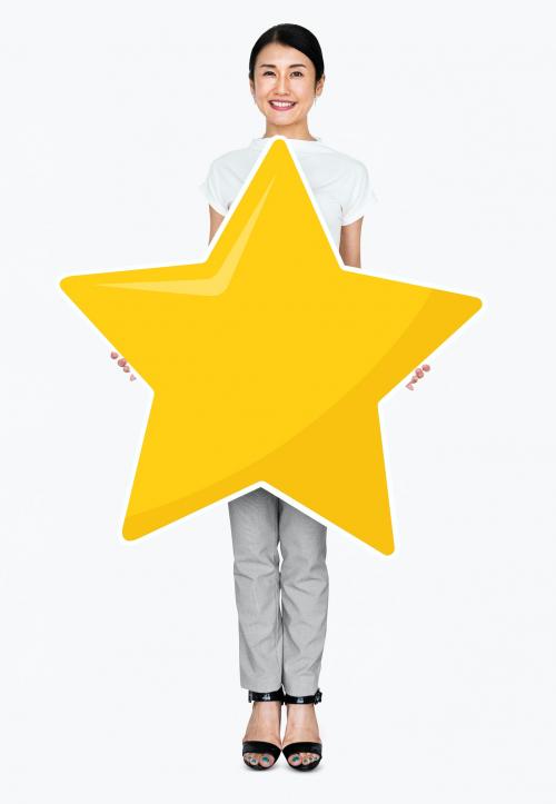 Businesswoman holding a golden star rating symbol - 477452