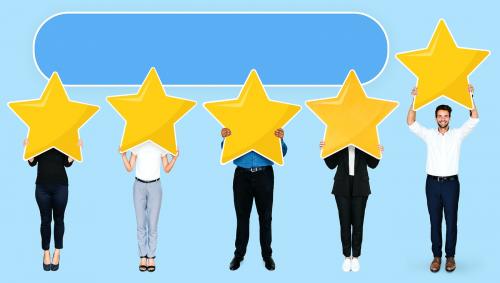 Diverse businesspeople showing golden star rating symbol - 477462