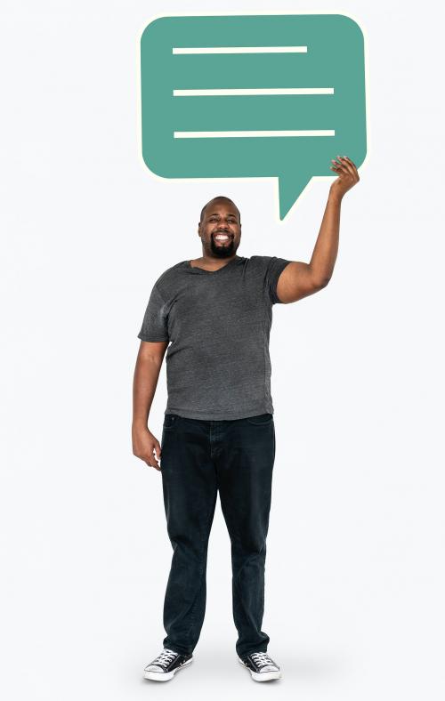 Cheerful man showing a blank speech bubble - 477501