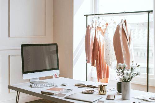 Clothes on a hanger in a boutique - 1220865