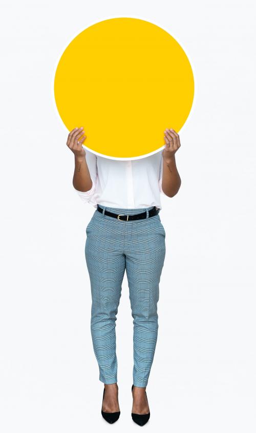 Woman covering her face with a yellow board - 475717