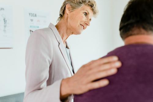 Physician doing a medical checkup on a patient - 1226898