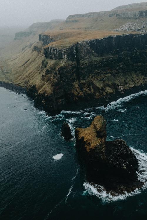 Drone shot of Talisker Bay on the Isle of Skye in Scotland - 935943