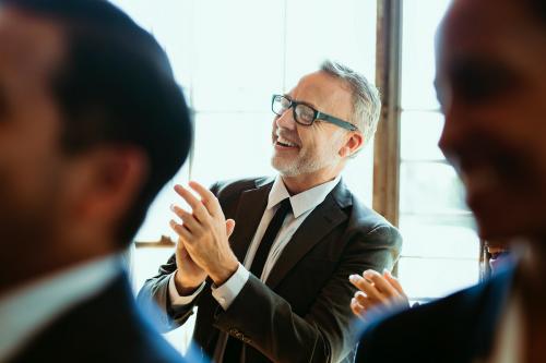 Diverse business people applauding with joy - 1217966