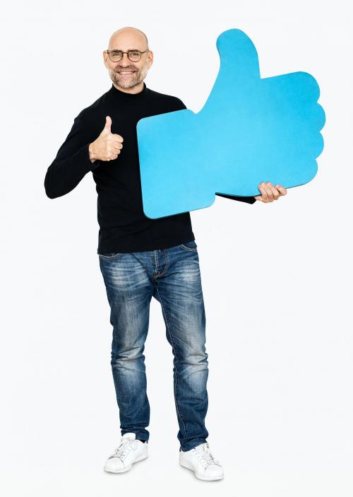 A man holding a thumbs up icon - 475100