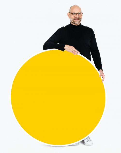 Man holding a round yellow board - 475116