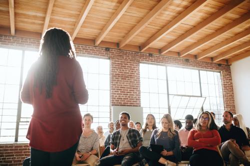 Black woman speaking in a seminar - 1223794