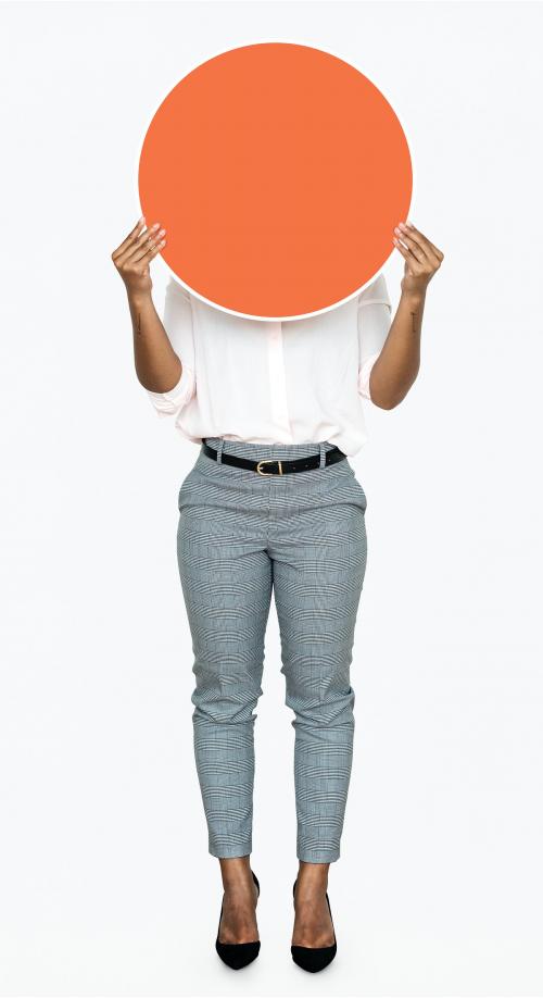 Woman holding a round orange board - 475138