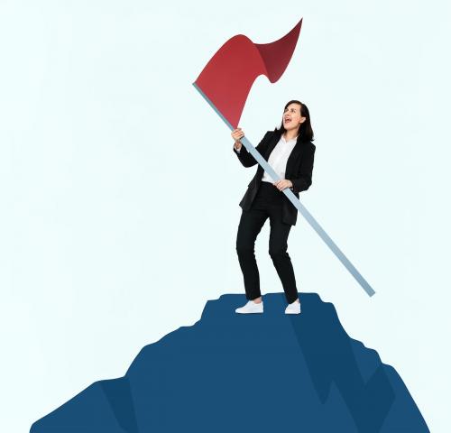 Woman holding a flag on top of a mountain - 475261