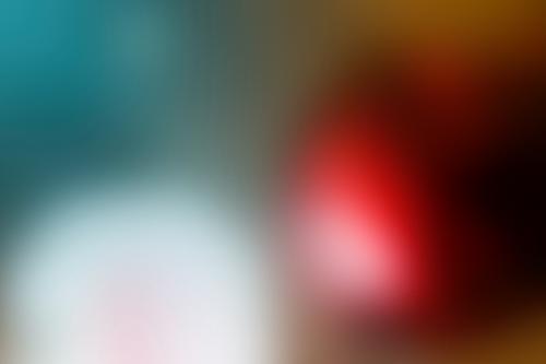 Blurry red and white Christmas baubles background - 1229664