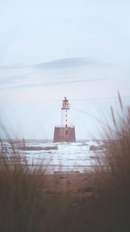 Rattray Head lighthouse at Aberdeenshire coast, Scotland - 1230443