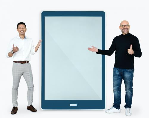 Cheerful men showing a tablet screen - 475349