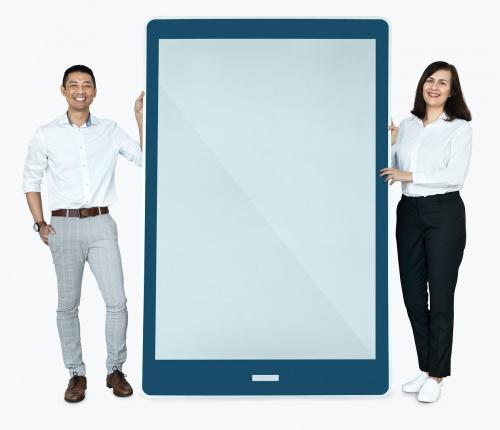 Cheerful people standing beside a tablet - 475457