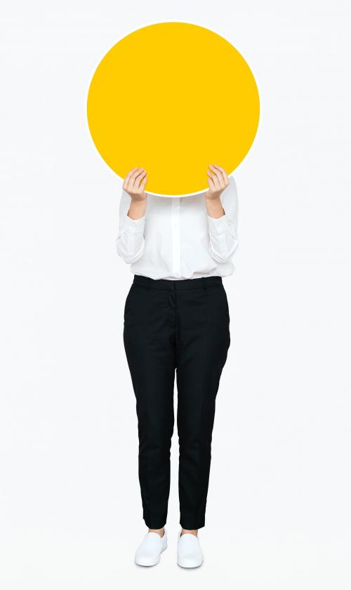 Woman holding a round yellow board - 475462