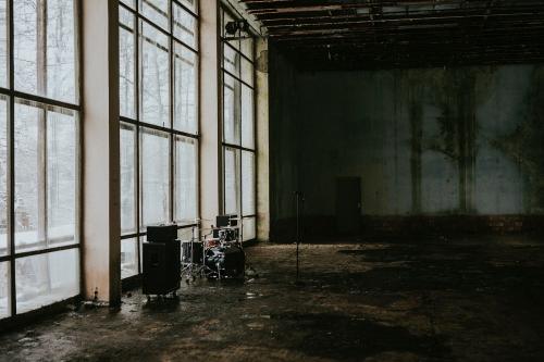 Empty industrial building setup for a music video shoot - 598234