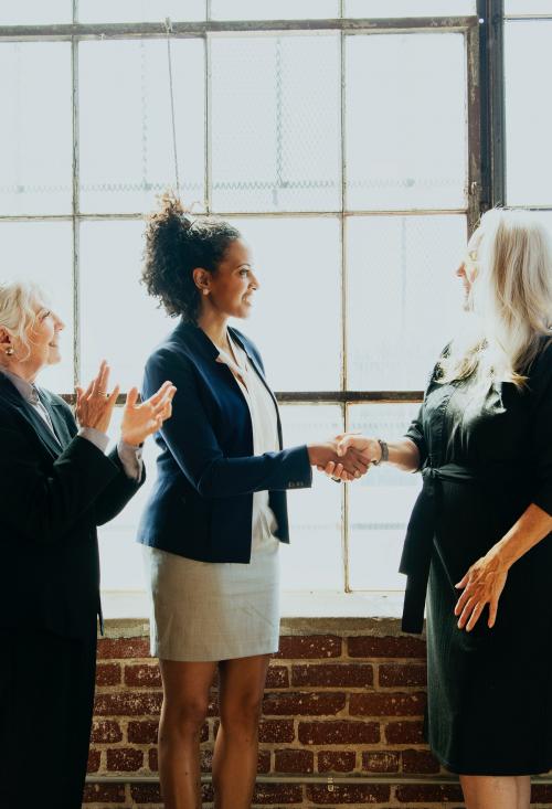 Handshake in a business meeting - 1217892