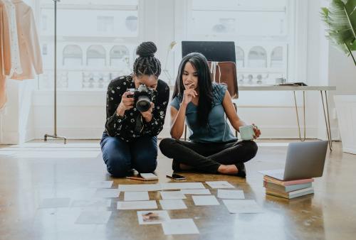 Creative designer planning a project in a brown marble floor - 1221023