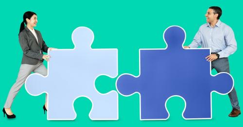 Business people connecting jigsaw puzzle pieces - 470546