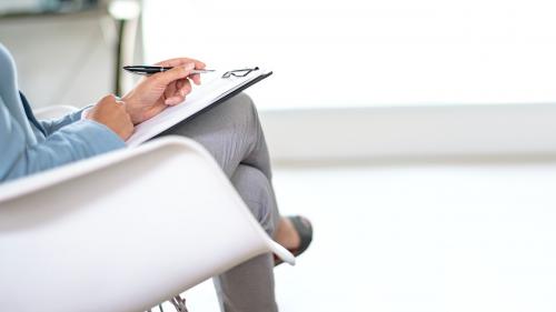 Businesswoman holding a personal notebook - 1226859