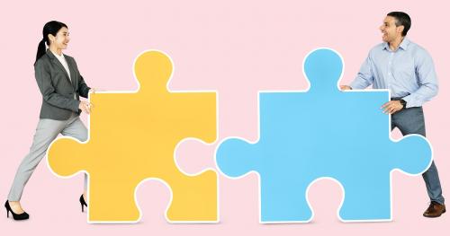 Business people connecting jigsaw puzzle pieces - 470625