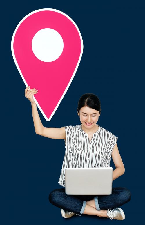 Woman holding a location pin symbol - 470667