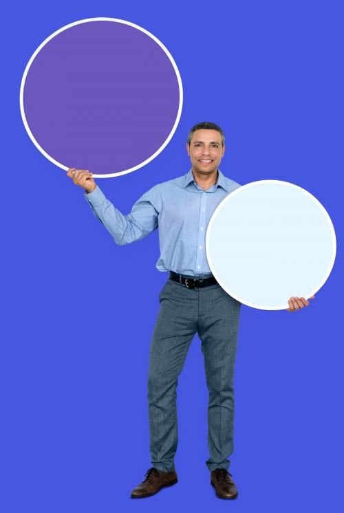 Businessman holding blank round boards - 470757