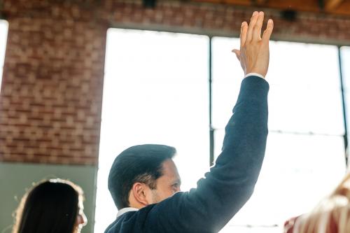 Businessman raising hand up in the air - 2020027