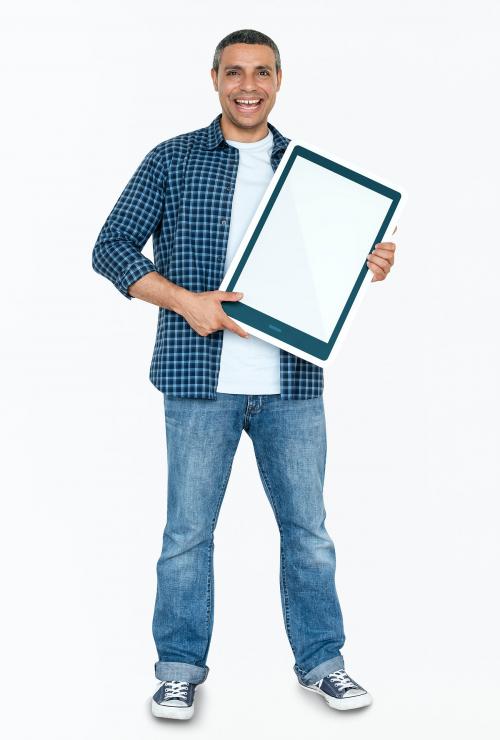 Happy man holding a tablet icon - 469508