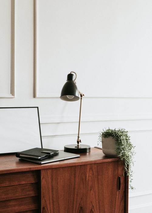 Wooden cabinet against a white wall - 1224470